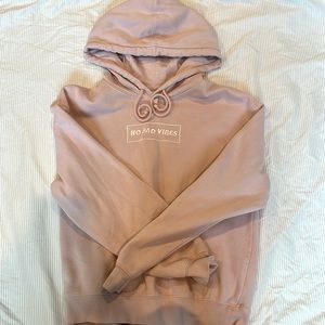 powder pink “no bad vibes” hoodie